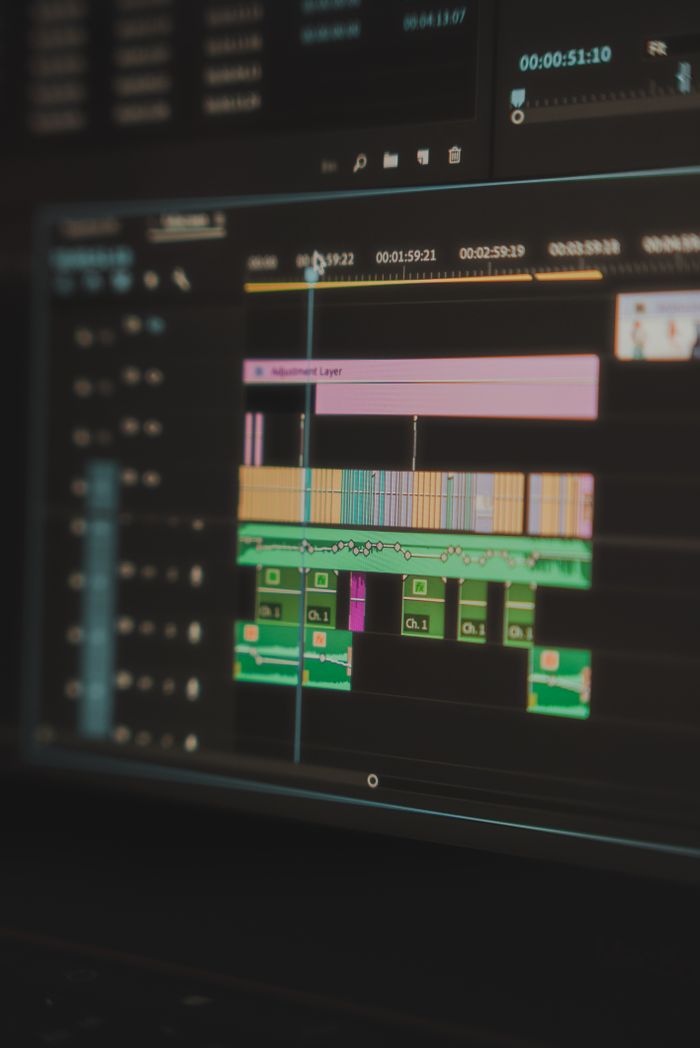 Home Detailed view of a video editing timeline displayed on a computer screen, highlighting the tools used in video production.